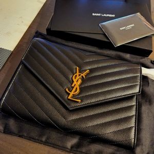 BRAND NEW YSL CLUTCH